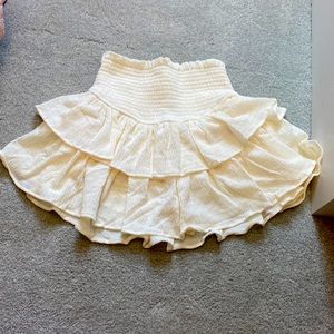 Flowy beach skirt in the crème color from beachy peach with built in shorts